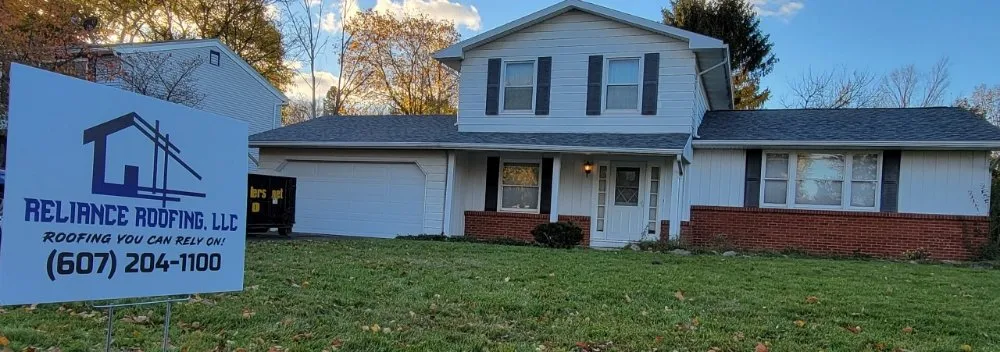 Slide of Reliance Roofing