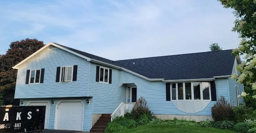 Slide of Reliance Roofing