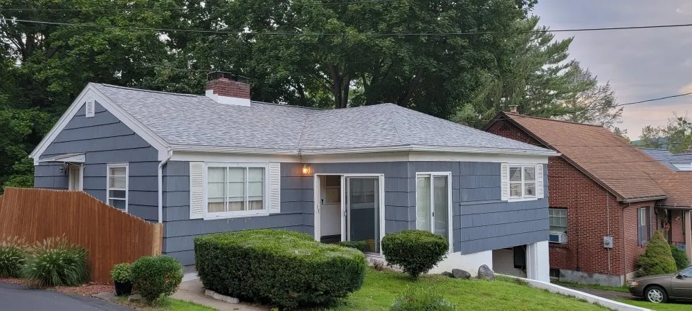 Slide of Reliance Roofing