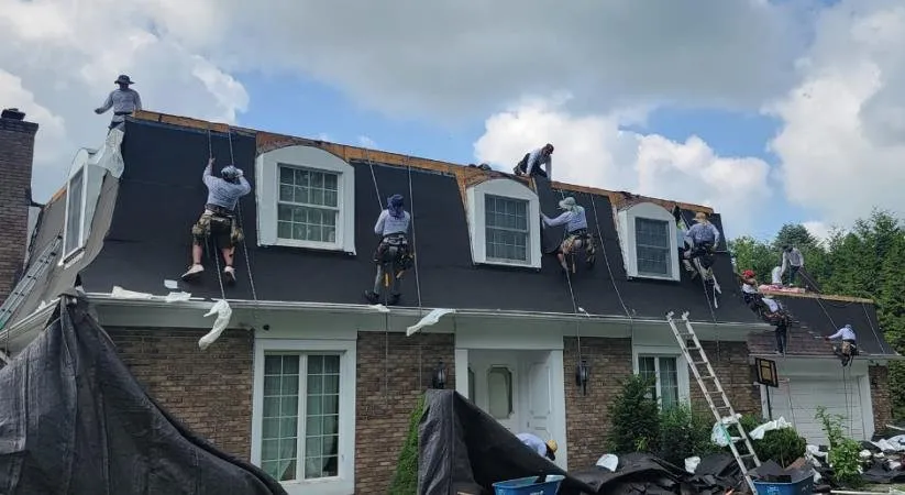 Slide of Reliance Roofing