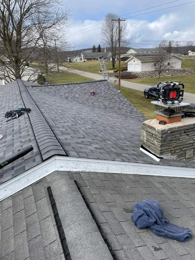 Slide of Reliance Roofing