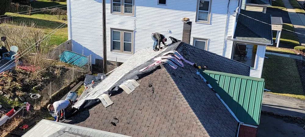 Slide of Reliance Roofing