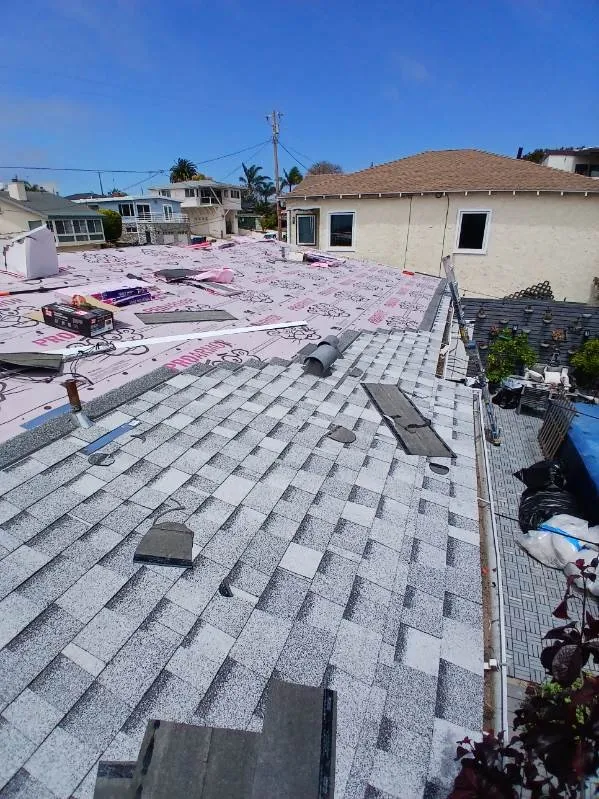 Slide of Reliance Roofing