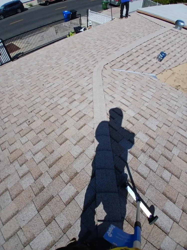 Slide of Reliance Roofing