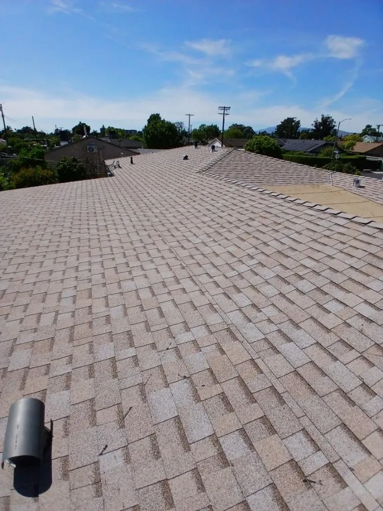 Slide of Reliance Roofing