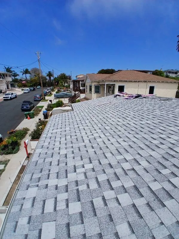 Slide of Reliance Roofing