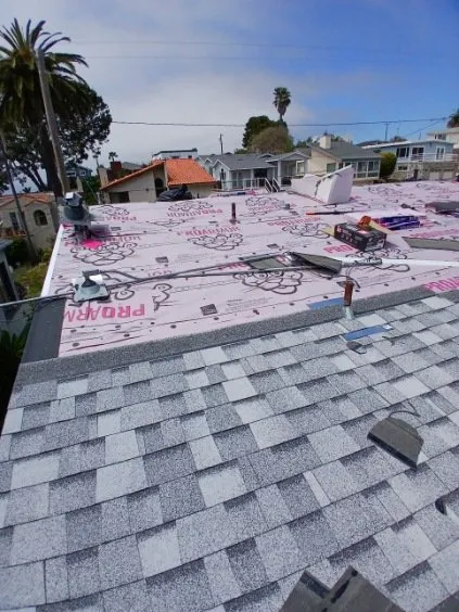 Slide of Reliance Roofing