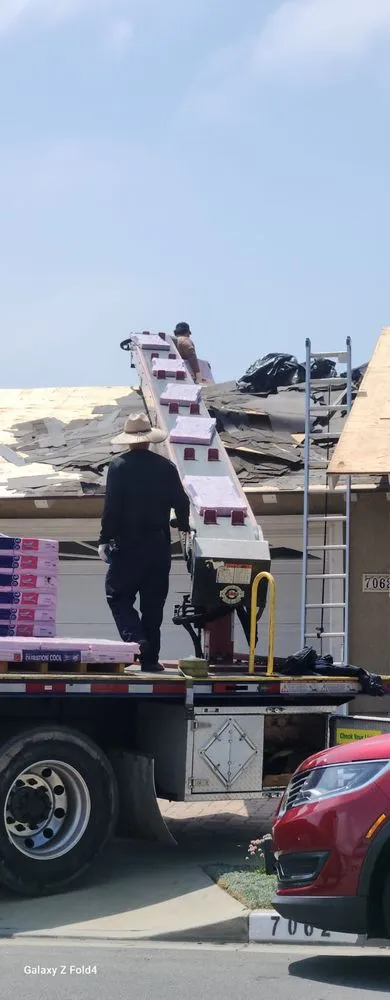 Slide of Reliance Roofing