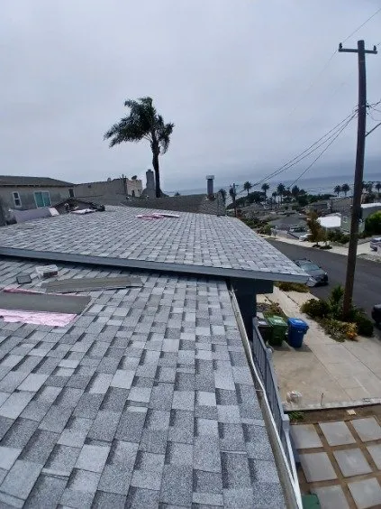 Slide of Reliance Roofing