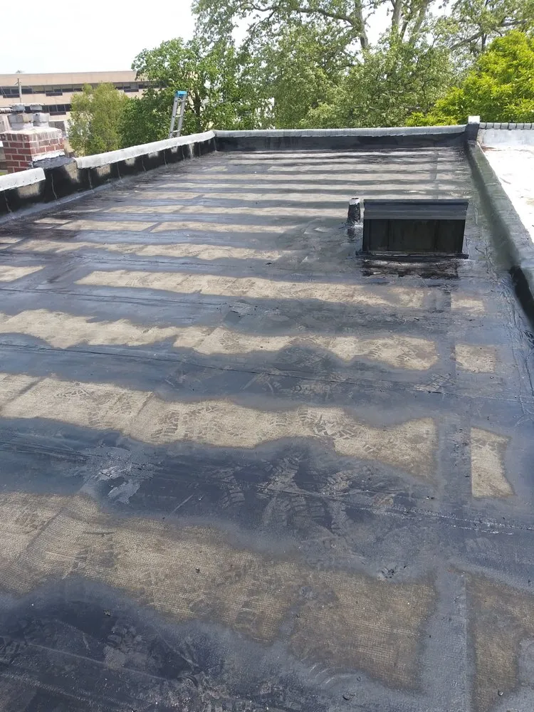 Slide of Reliance Roofing Of Delco