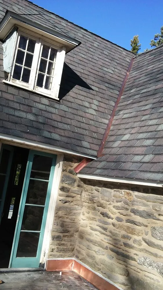 Slide of Reliance Roofing Of Delco