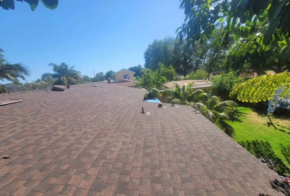 Slide of Reliance Roofing