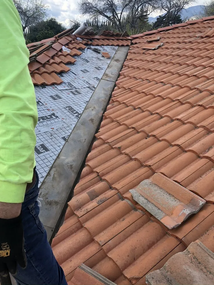 Slide of Reliance Roofing