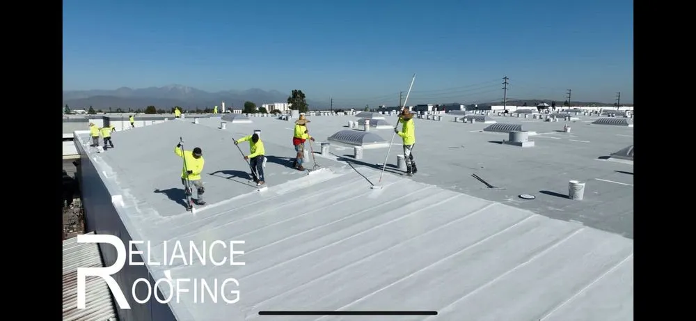 Slide of Reliance Roofing