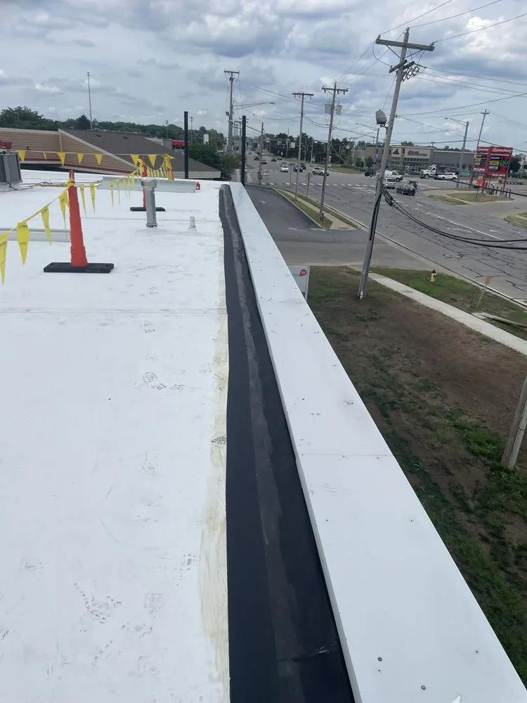 Slide of Reliance Roofing Systems