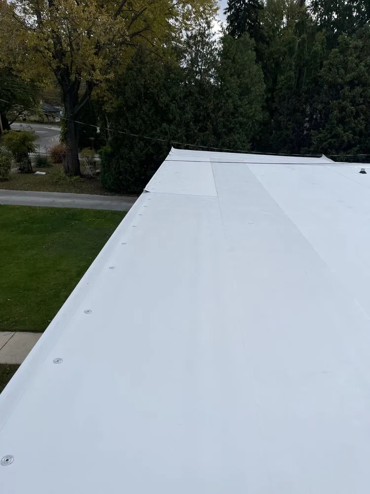 Slide of Reliance Roofing Systems