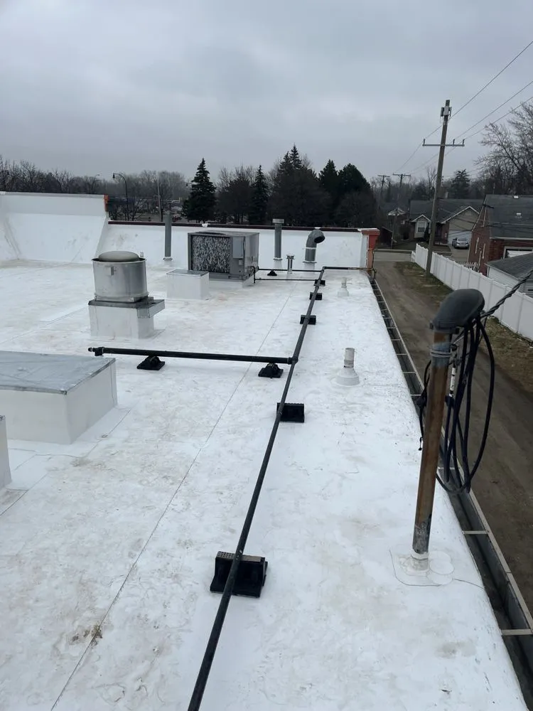 Slide of Reliance Roofing Systems