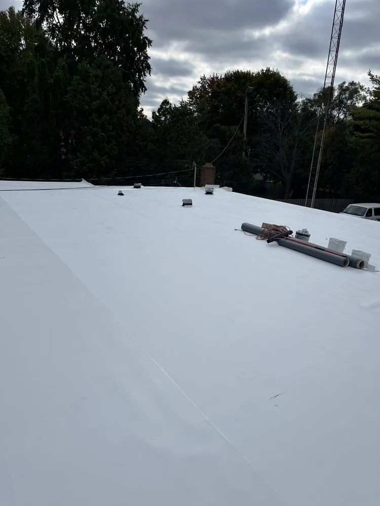 Slide of Reliance Roofing Systems