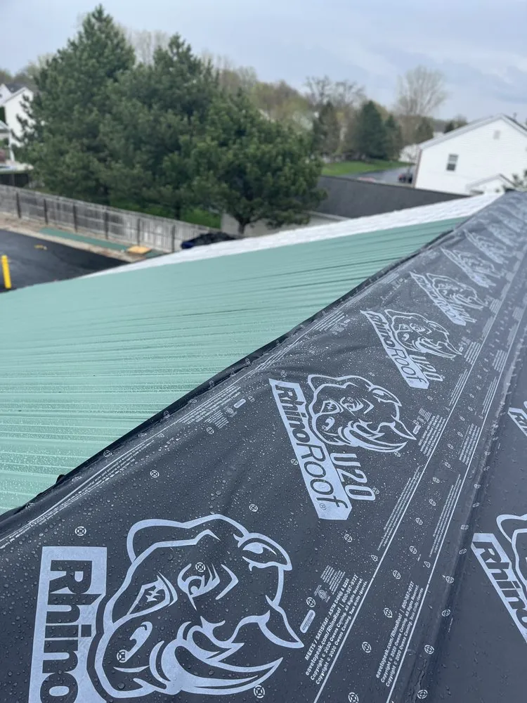 Slide of Reliance Roofing Systems