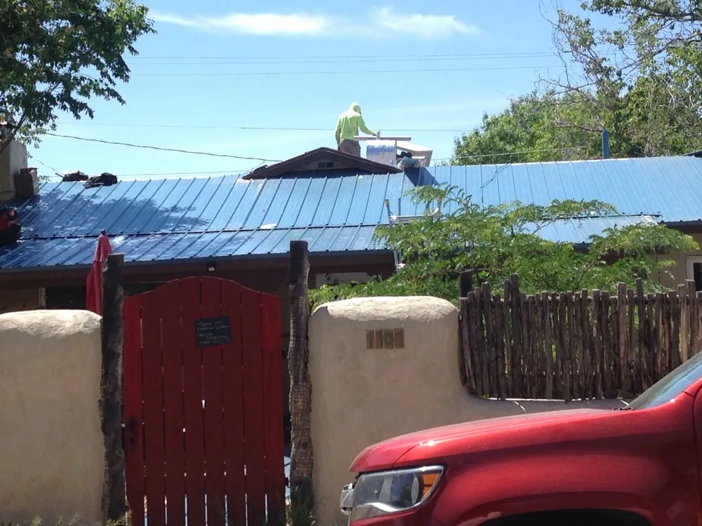 Slide of Rely on Me Roofing