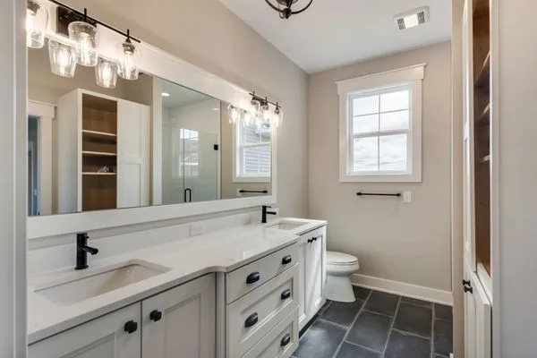 Renaissance Exteriors & Remodeling Logo