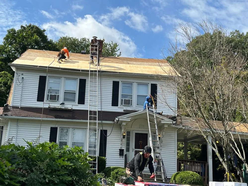 Slide of Renaissance Roofing and Restoration