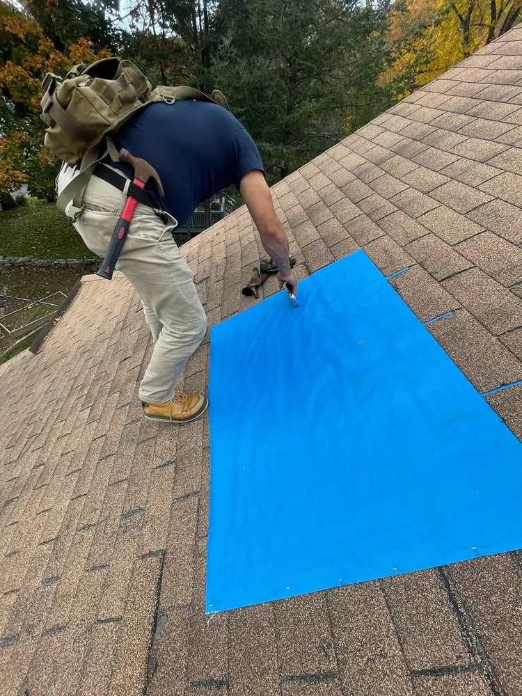 Slide of Renaissance Roofing and Restoration