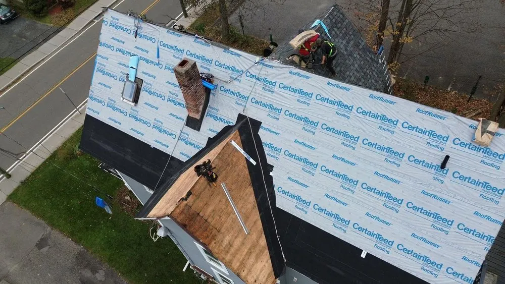 Slide of Renaissance Roofing and Restoration