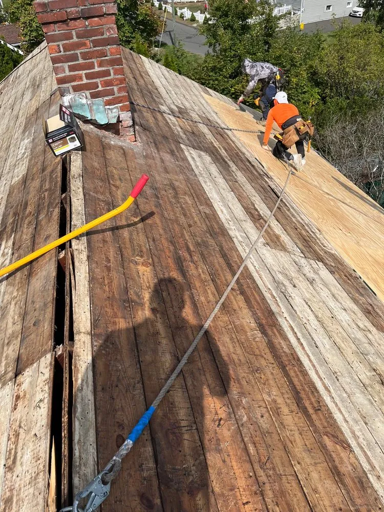 Slide of Renaissance Roofing and Restoration