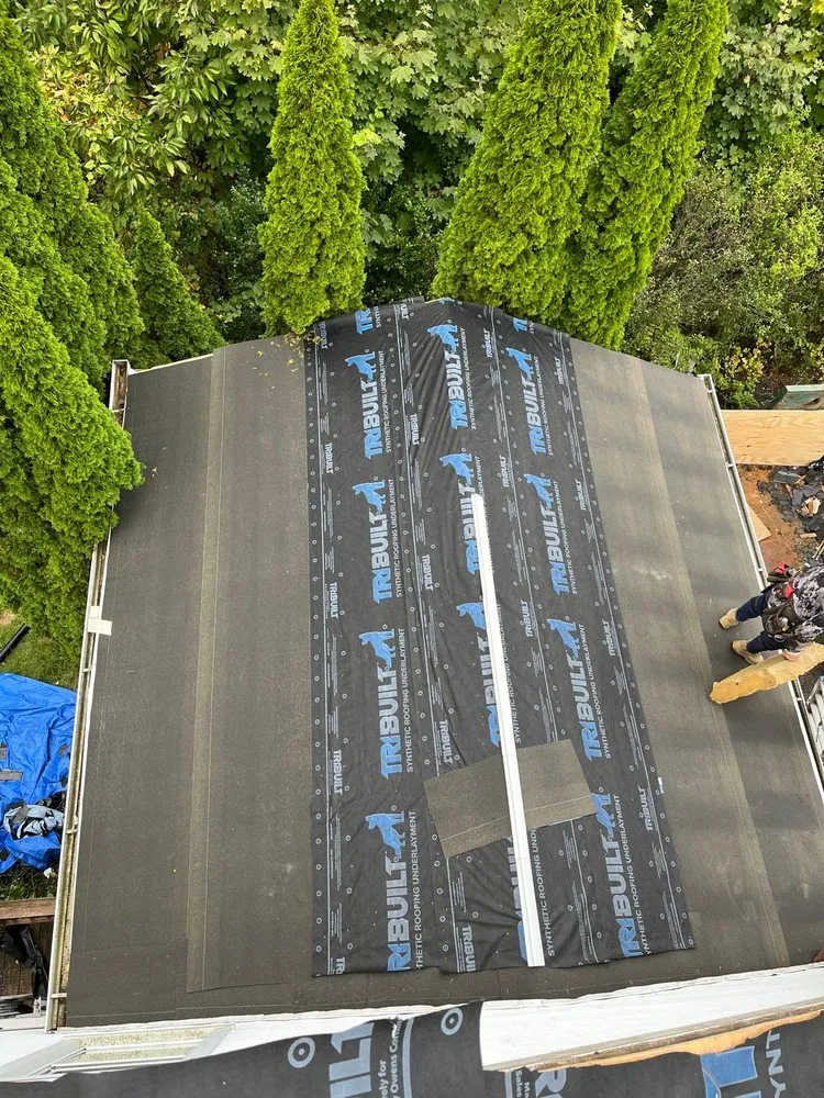 Slide of Renaissance Roofing and Restoration