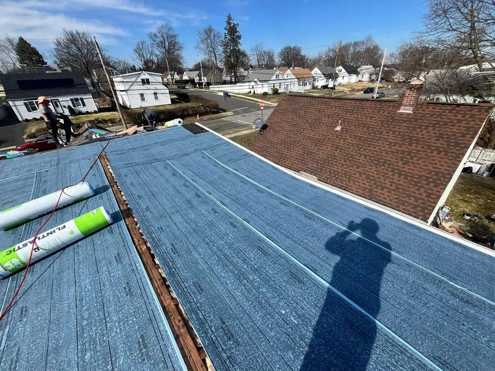 Slide of Renaissance Roofing and Restoration