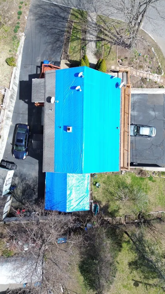 Slide of Renaissance Roofing and Restoration