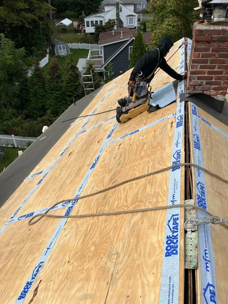 Slide of Renaissance Roofing and Restoration