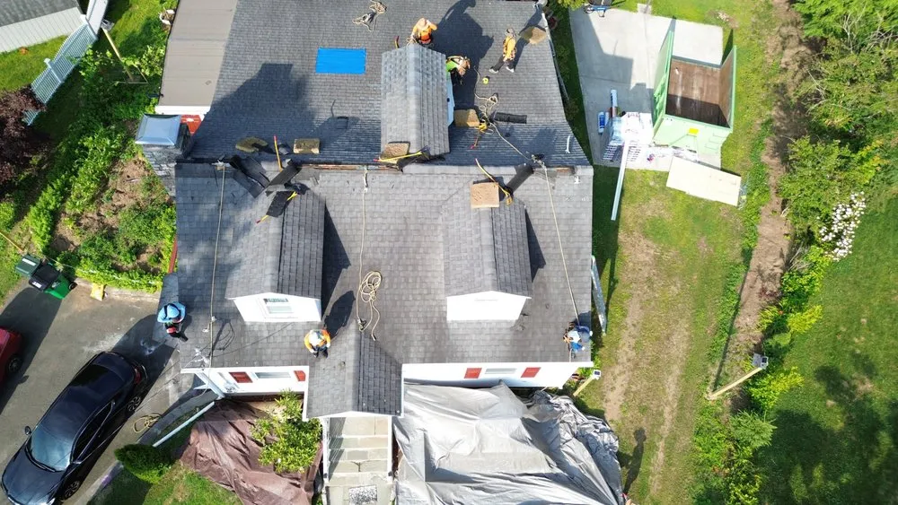 Slide of Renaissance Roofing and Restoration