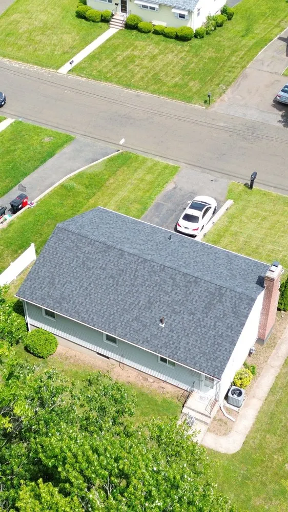 Slide of Renaissance Roofing and Restoration