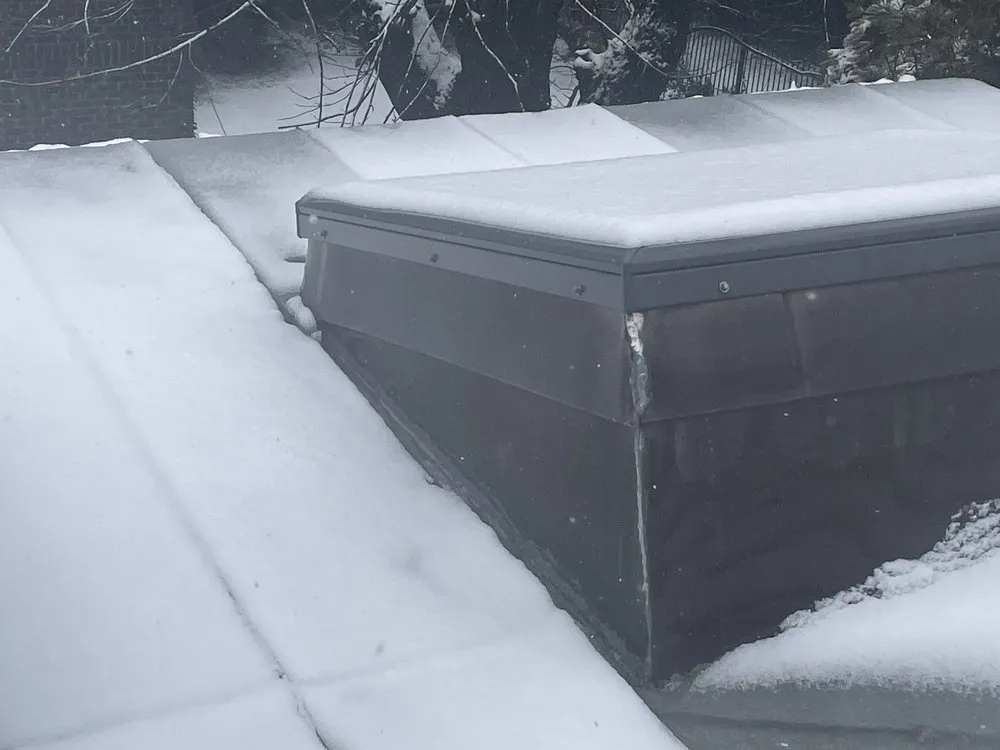 Slide of Renaissance Roofing