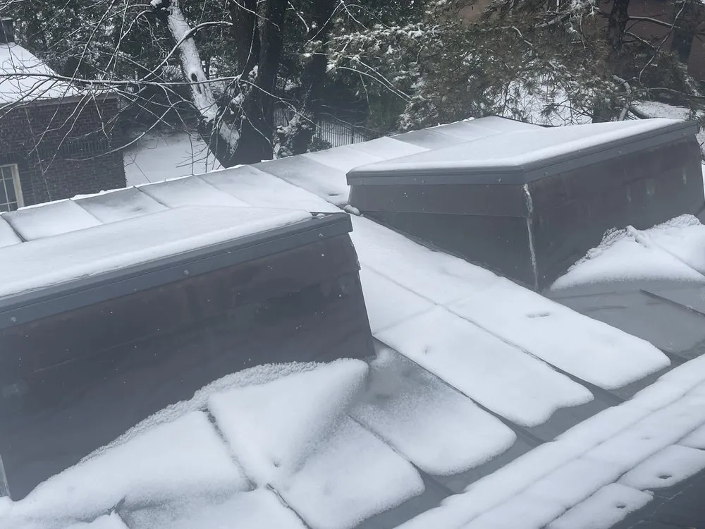 Slide of Renaissance Roofing