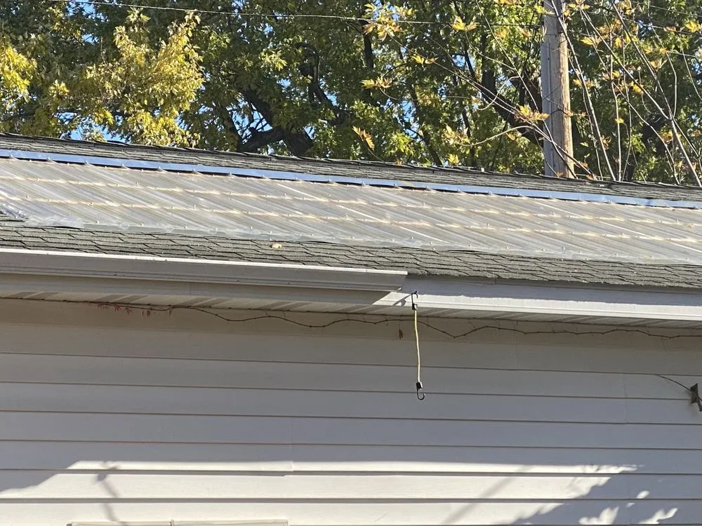 Slide of Renda the Roofer