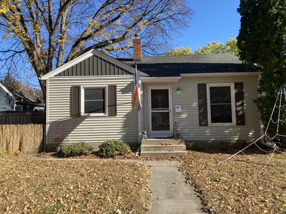 Slide of Renda the Roofer