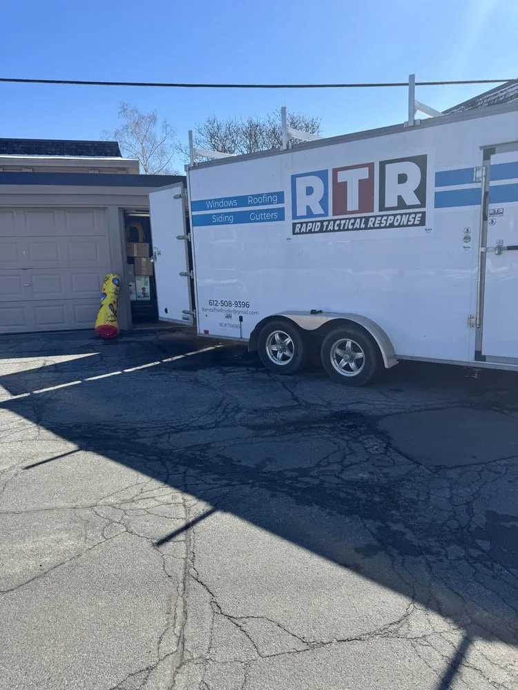 Slide of Renda the Roofer