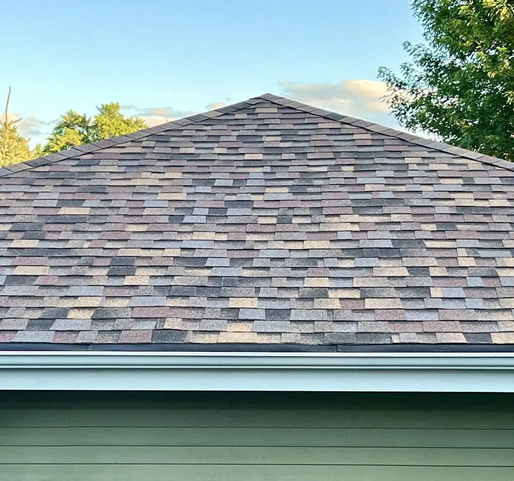 Slide of Renda the Roofer