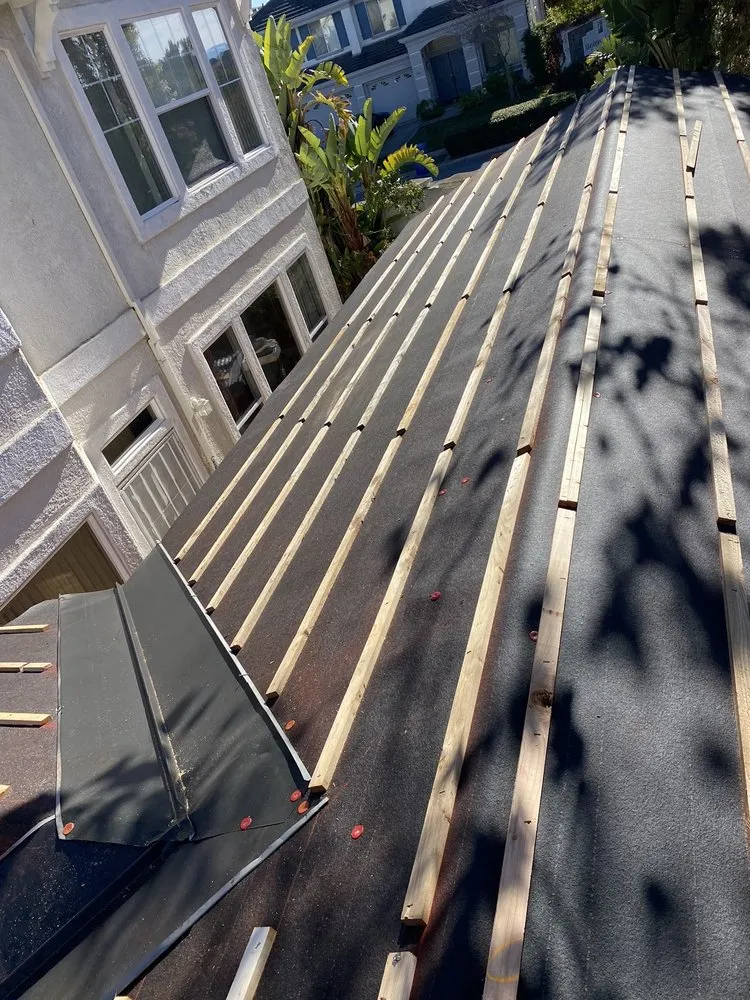 Slide of Rendon roofing