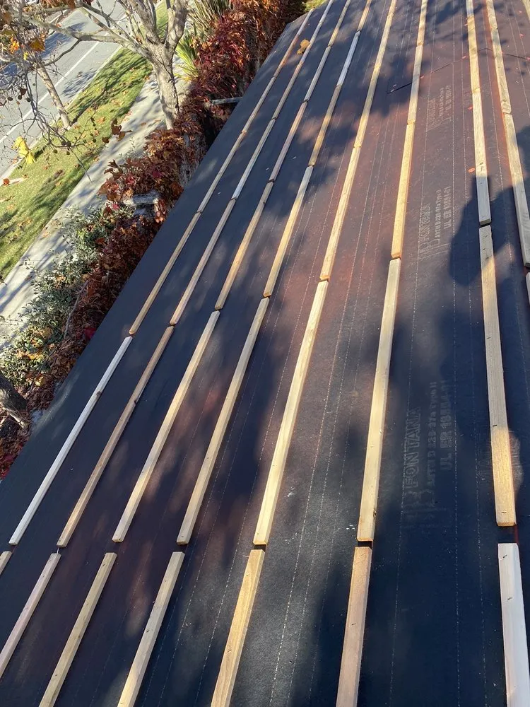 Slide of Rendon roofing