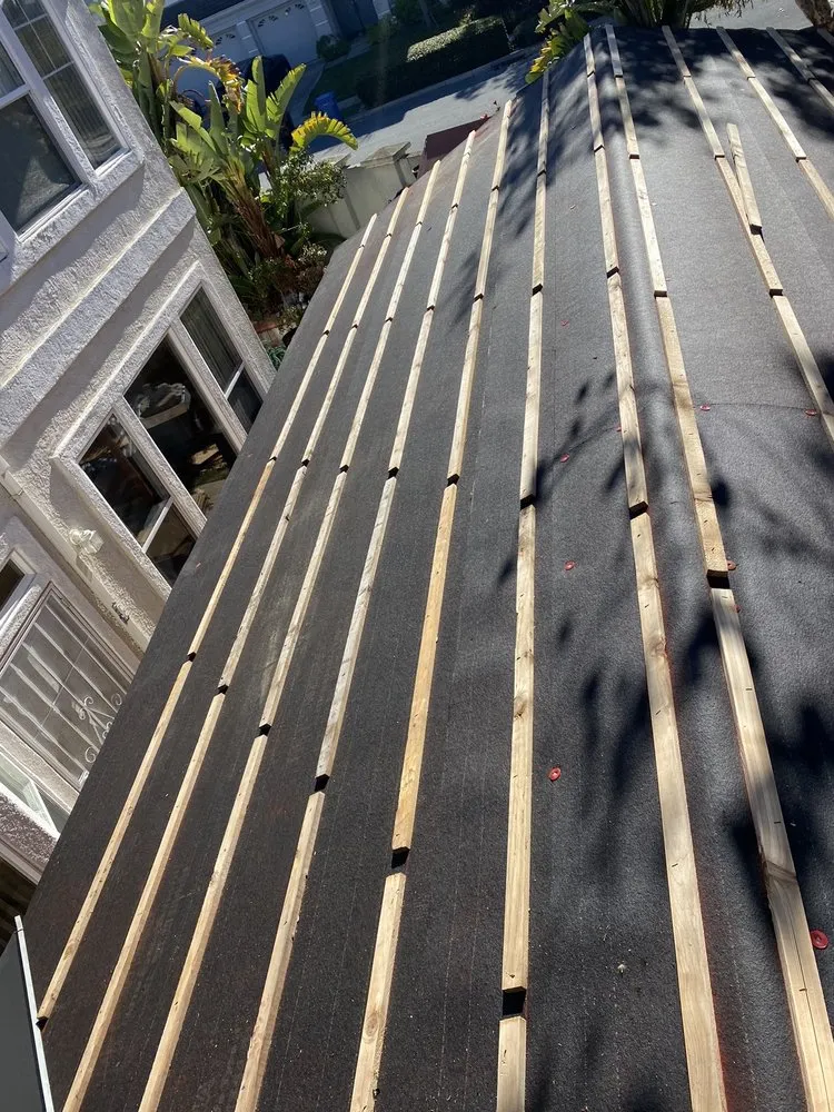 Slide of Rendon roofing