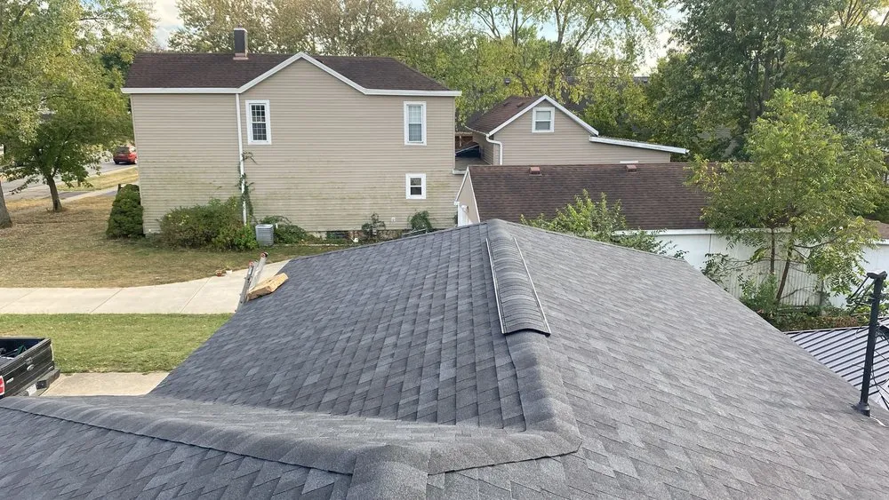 Slide of Rene Roofing