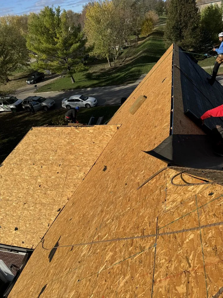 Slide of Rene Roofing