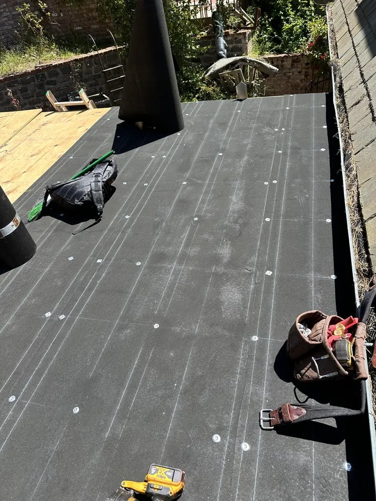 Slide of Rene’s Roofing