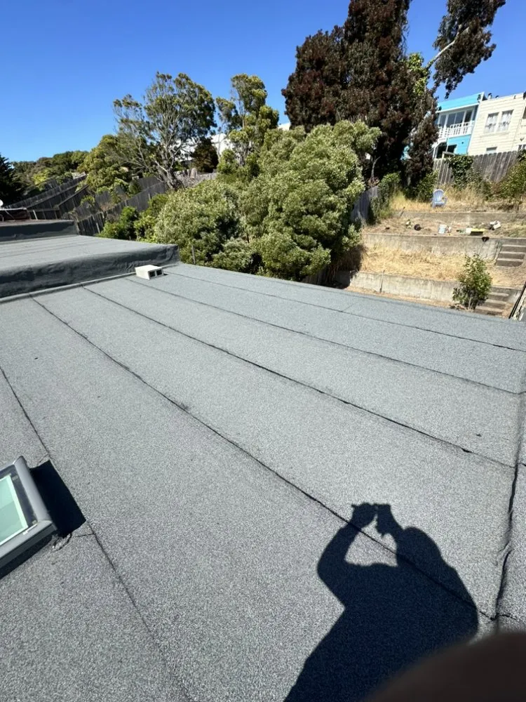 Slide of Rene’s Roofing