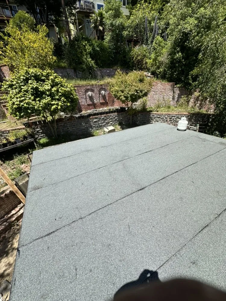 Slide of Rene’s Roofing