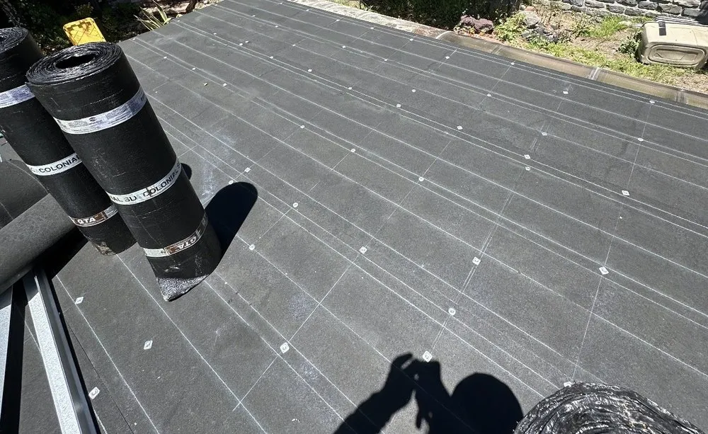 Slide of Rene’s Roofing